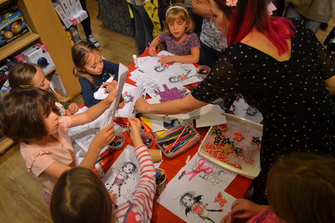 Children colouring Isadora Moon at the Welwyn Waterstones event