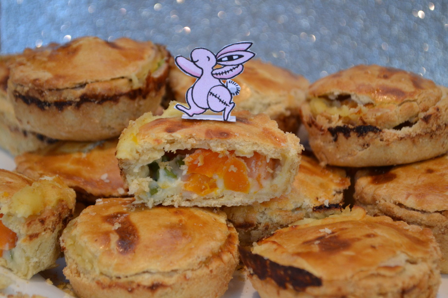 Pink Rabbit posing with his carrot and pea pies