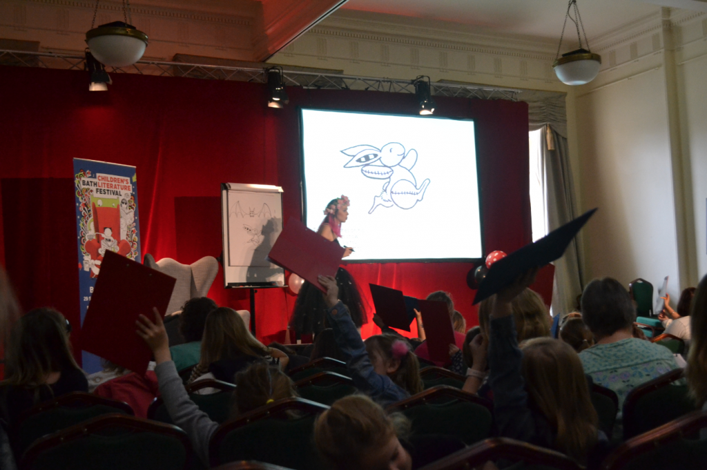 Harriet Muncaster performing an Isadora Moon event at Bath Children's Literature Festival