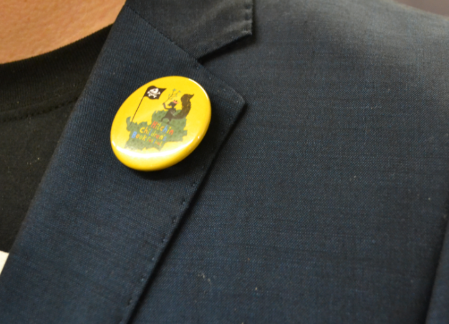 Danny Pearson sporting his Hitchin Children's Book Festival pin