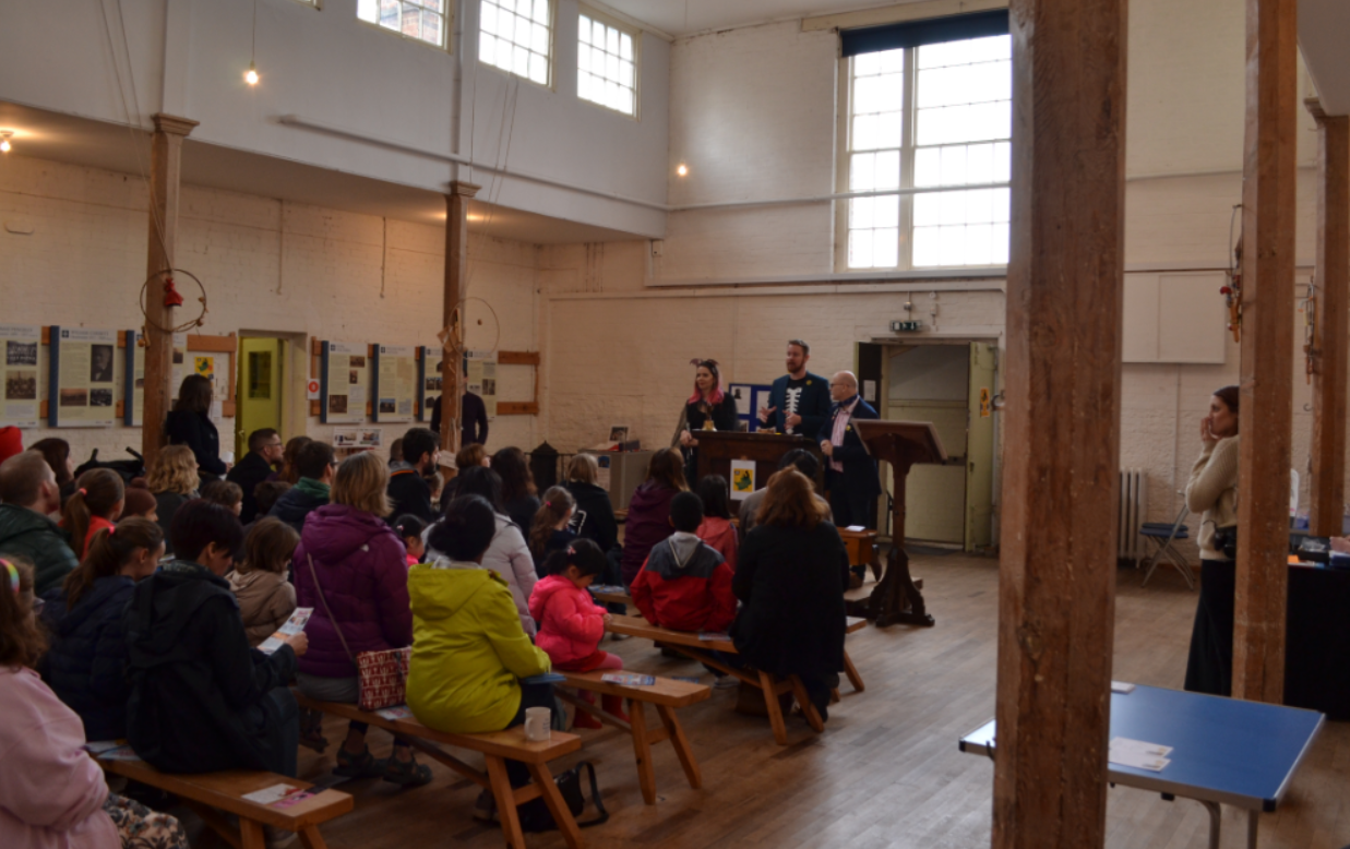 Harriet Muncaster answering questions at the end of Hitchin Childrens Book Festival