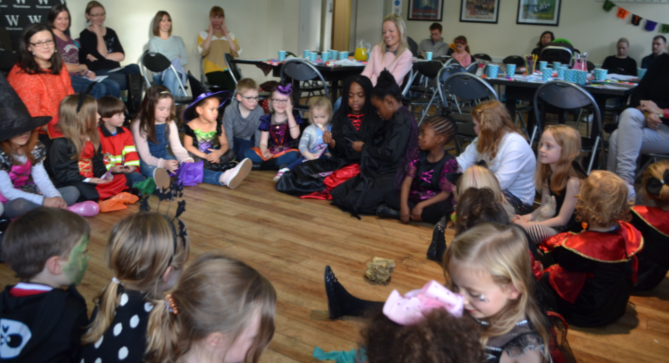 Pass the parcel at Manchester Waterstones Isadora Moon Halloween Party
