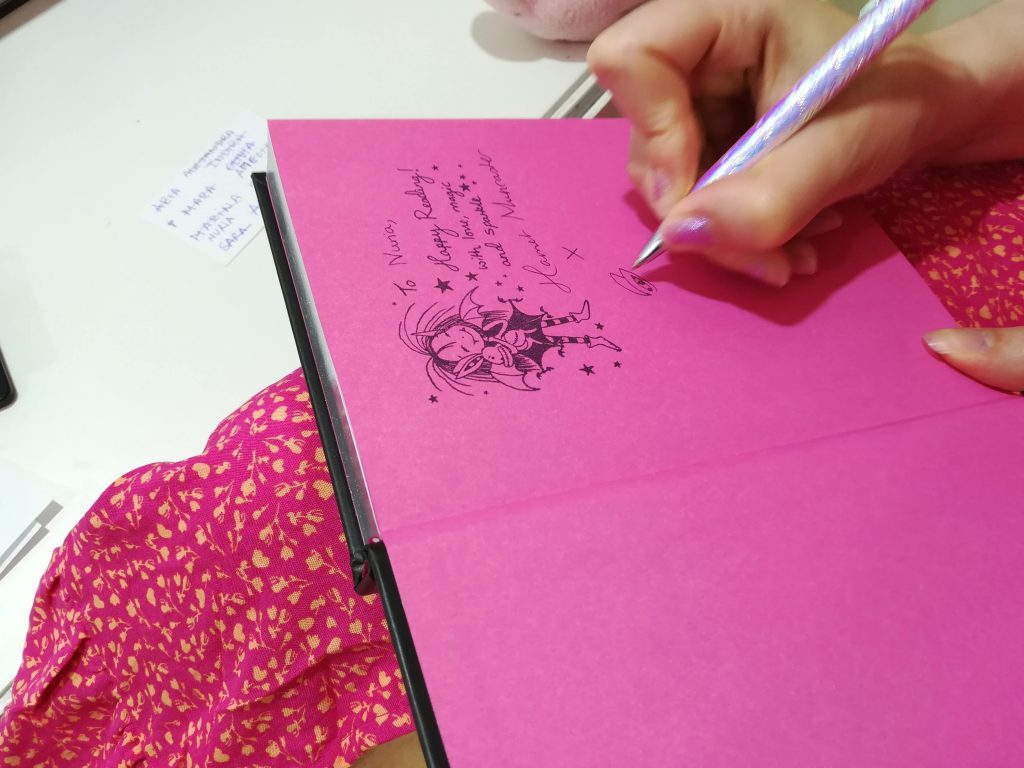 Harriet Muncaster Signing an Isadora Moon Book in Madrid